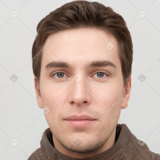 Neutral white young-adult male with short  brown hair and grey eyes