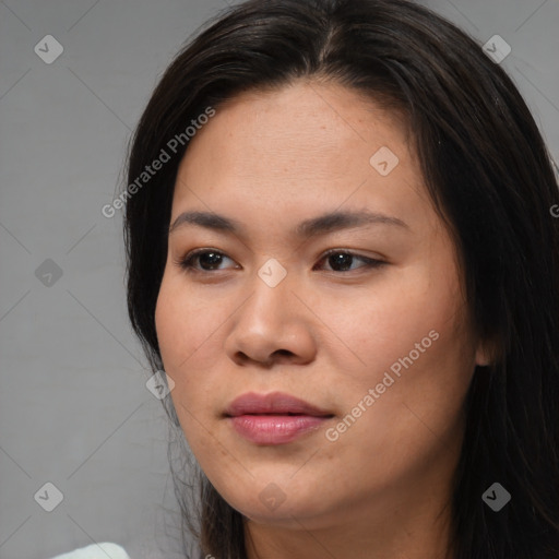 Joyful asian young-adult female with long  brown hair and brown eyes