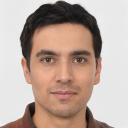 Neutral white young-adult male with short  black hair and brown eyes