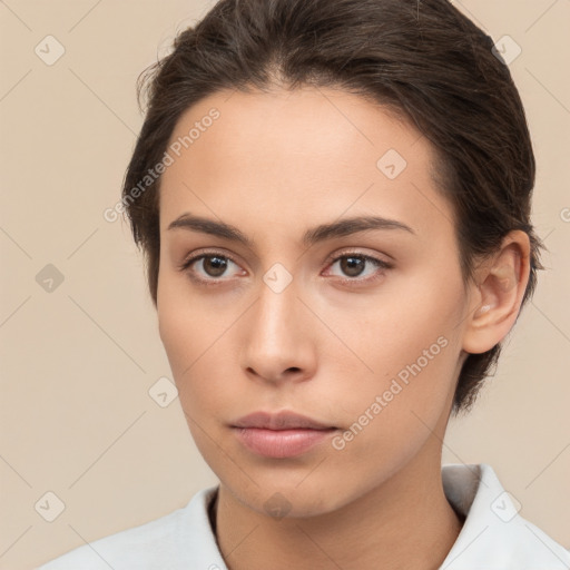 Neutral white young-adult female with medium  brown hair and brown eyes