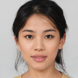 Neutral asian young-adult female with medium  brown hair and brown eyes