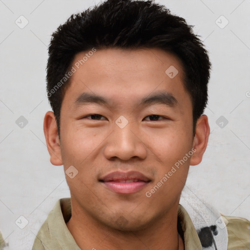 Joyful asian young-adult male with short  black hair and brown eyes