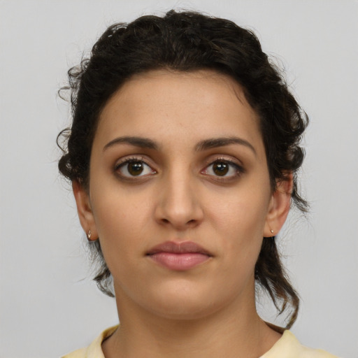 Neutral latino young-adult female with medium  black hair and brown eyes
