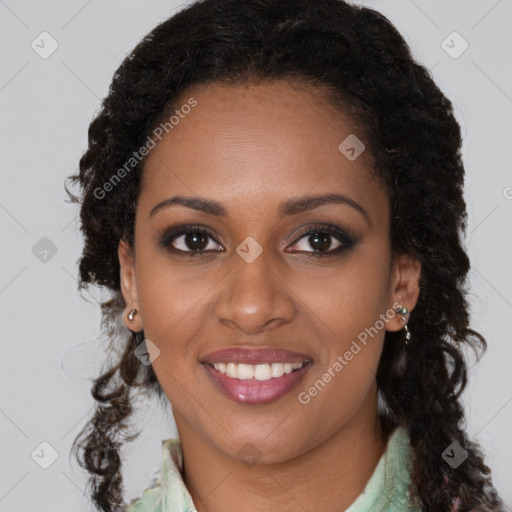 Joyful black young-adult female with long  brown hair and brown eyes