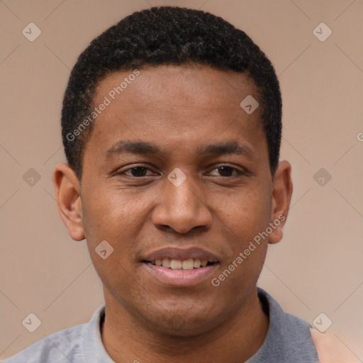 Joyful latino young-adult male with short  brown hair and brown eyes