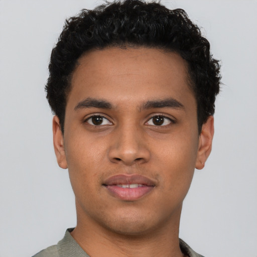 Neutral latino young-adult male with short  brown hair and brown eyes