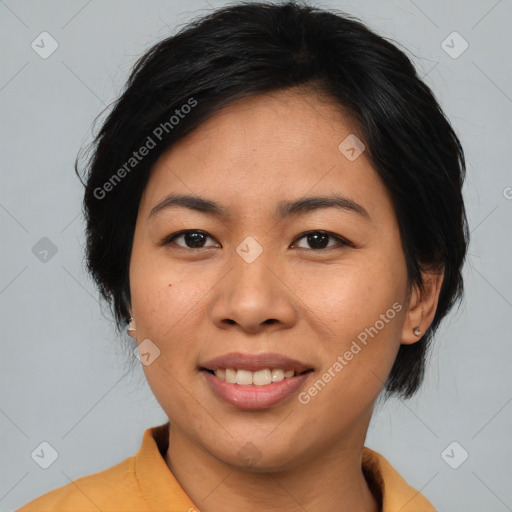 Joyful asian young-adult female with medium  black hair and brown eyes