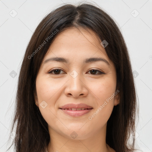 Joyful white young-adult female with long  brown hair and brown eyes