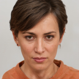 Neutral white young-adult female with short  brown hair and brown eyes