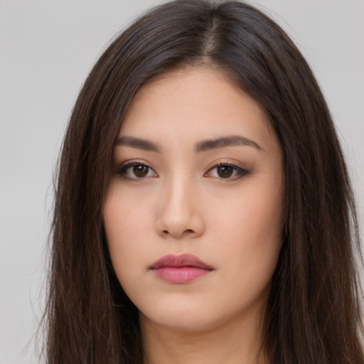 Neutral asian young-adult female with long  brown hair and brown eyes