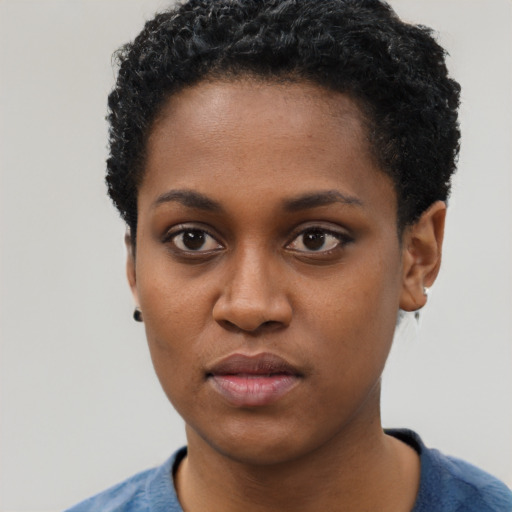 Neutral black young-adult female with short  black hair and brown eyes
