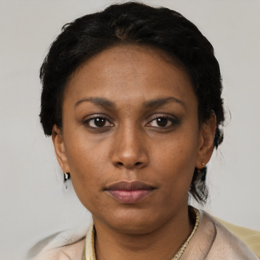 Neutral latino young-adult female with short  black hair and brown eyes
