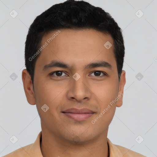 Joyful latino young-adult male with short  brown hair and brown eyes