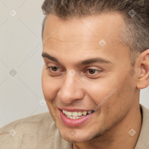 Joyful white young-adult male with short  brown hair and brown eyes