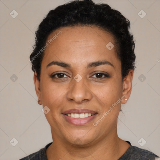 Joyful latino young-adult female with short  black hair and brown eyes