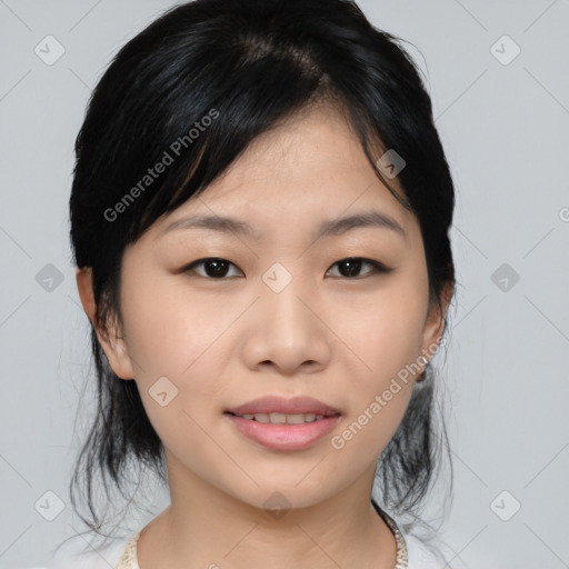 Joyful asian young-adult female with medium  black hair and brown eyes