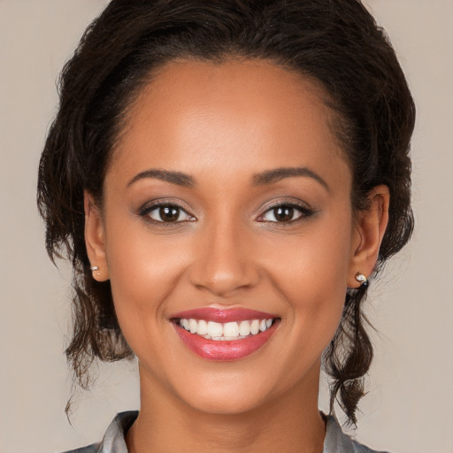 Joyful white young-adult female with long  brown hair and brown eyes