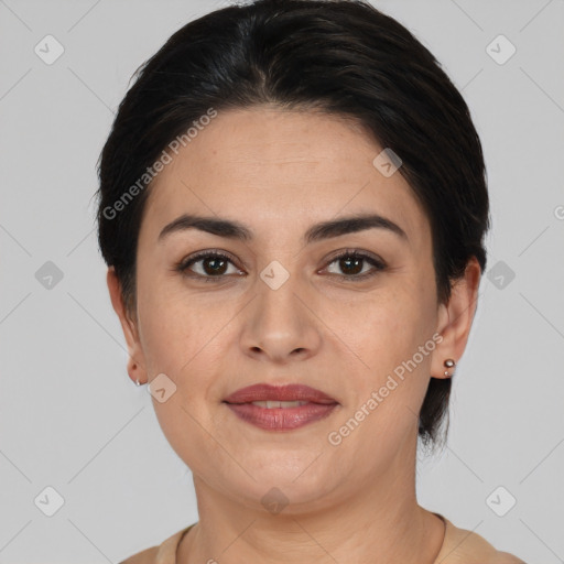 Joyful white adult female with medium  brown hair and brown eyes