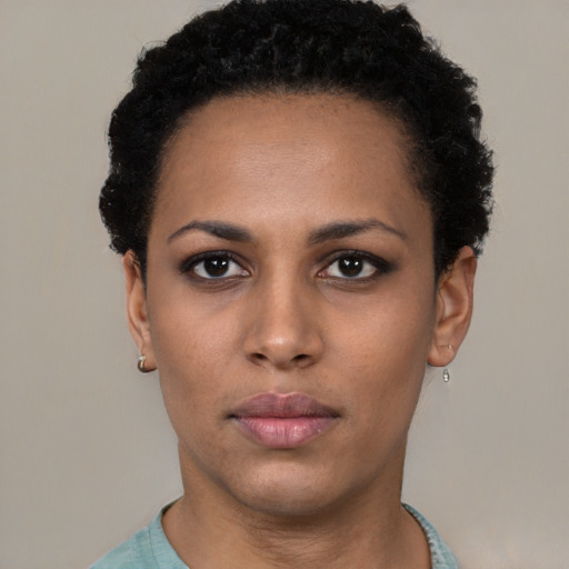 Neutral latino young-adult female with short  black hair and brown eyes