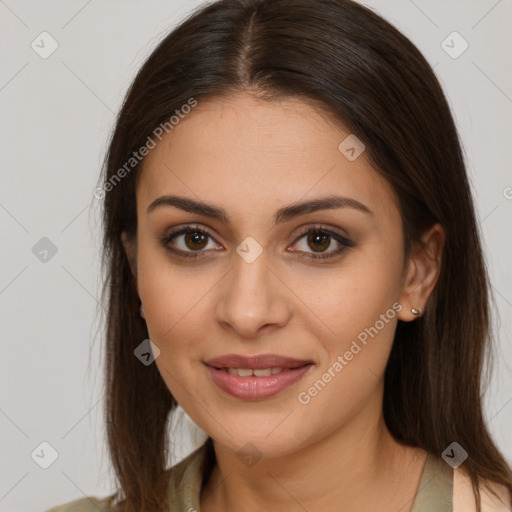 Joyful white young-adult female with long  brown hair and brown eyes