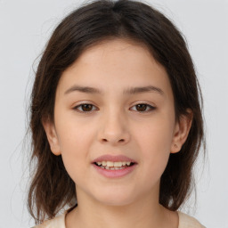 Joyful white child female with medium  brown hair and brown eyes