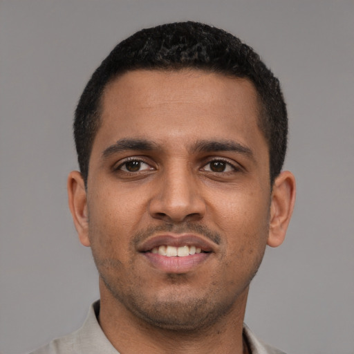 Neutral black young-adult male with short  brown hair and brown eyes