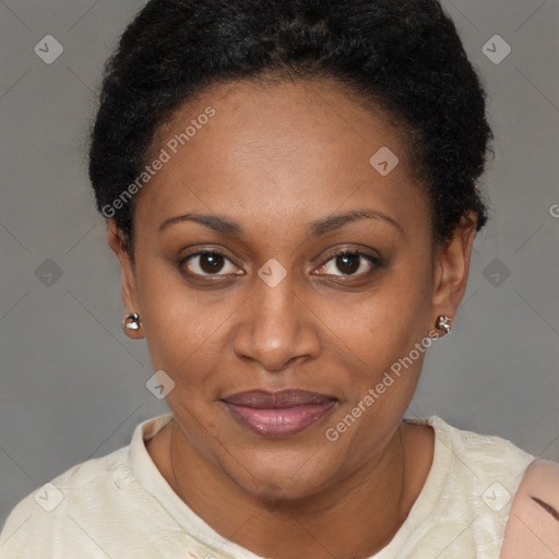 Joyful black adult female with short  brown hair and brown eyes