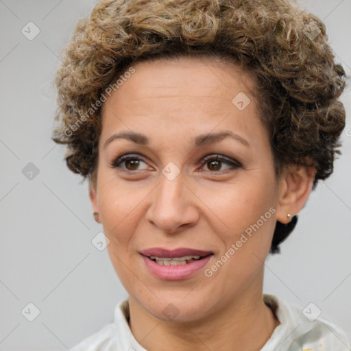 Joyful white adult female with short  brown hair and brown eyes