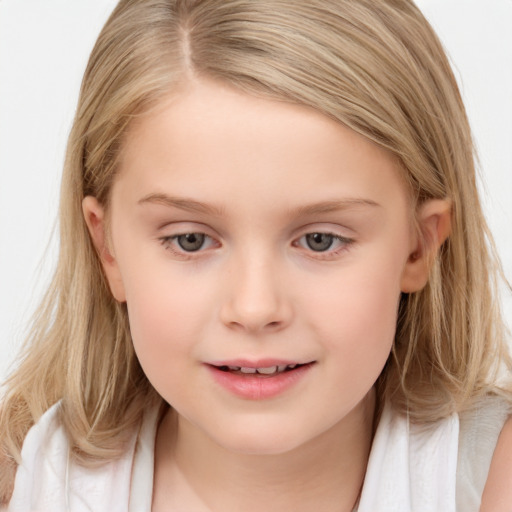 Joyful white child female with long  brown hair and brown eyes