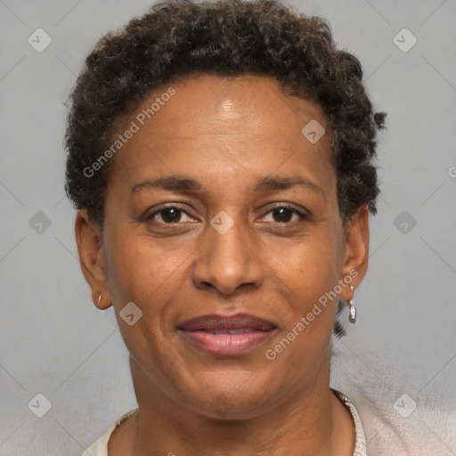 Joyful black adult female with short  brown hair and brown eyes