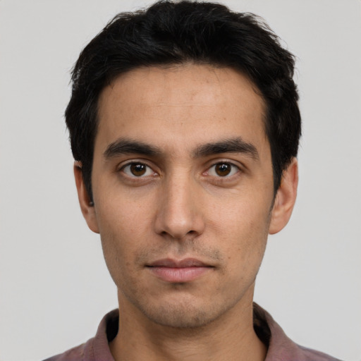 Neutral white young-adult male with short  black hair and brown eyes