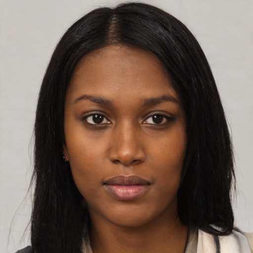 Neutral black young-adult female with long  black hair and brown eyes