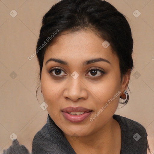 Joyful latino young-adult female with medium  black hair and brown eyes