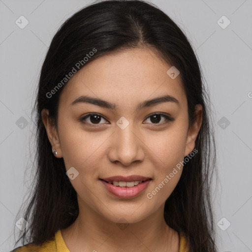 Joyful latino young-adult female with medium  brown hair and brown eyes