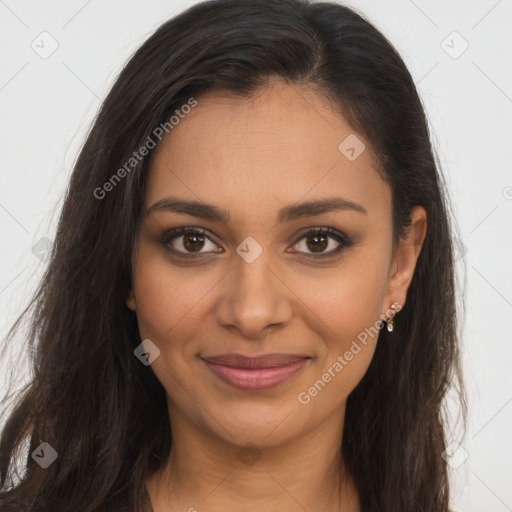 Joyful latino young-adult female with long  brown hair and brown eyes