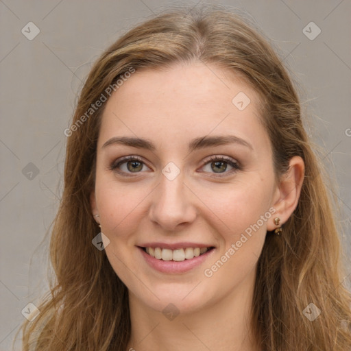 Joyful white young-adult female with long  brown hair and green eyes