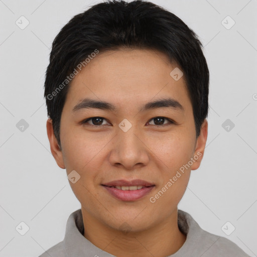 Joyful asian young-adult male with short  black hair and brown eyes