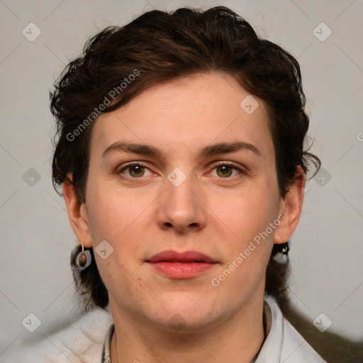 Joyful white young-adult female with medium  brown hair and green eyes