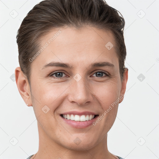 Joyful white young-adult female with short  brown hair and brown eyes