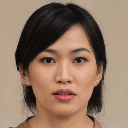 Neutral asian young-adult female with medium  black hair and brown eyes