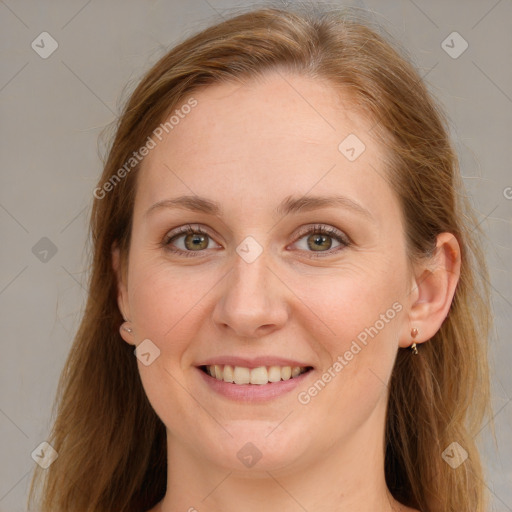 Joyful white young-adult female with long  brown hair and blue eyes