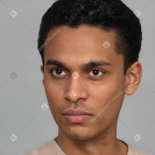 Neutral latino young-adult male with short  black hair and brown eyes