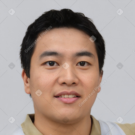 Joyful asian young-adult male with short  black hair and brown eyes