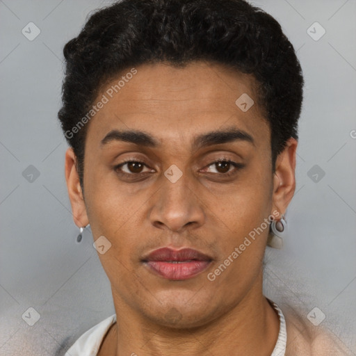 Joyful latino young-adult male with short  brown hair and brown eyes