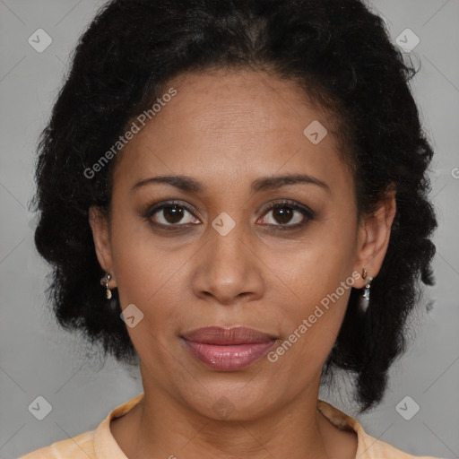 Joyful latino adult female with medium  brown hair and brown eyes