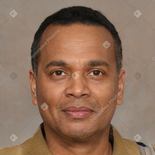 Joyful latino adult male with short  black hair and brown eyes