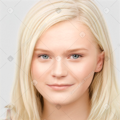 Joyful white young-adult female with long  brown hair and blue eyes