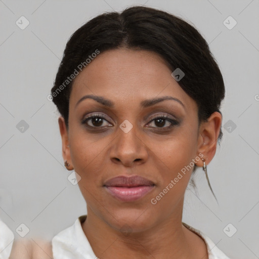 Joyful black young-adult female with short  brown hair and brown eyes