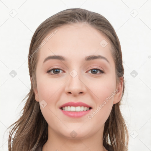 Joyful white young-adult female with long  brown hair and grey eyes