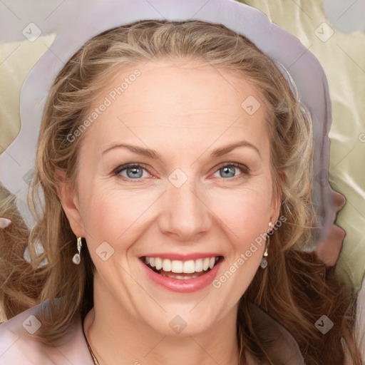 Joyful white young-adult female with long  brown hair and blue eyes